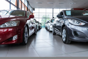 Stock of cars in showroom of automobile dealer